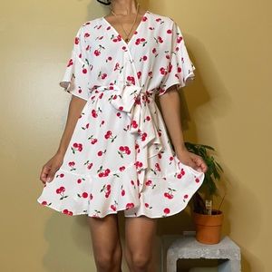 Aqua cherry 🍒 tie around frill dress.